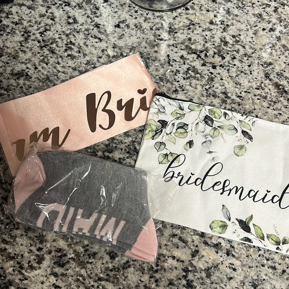 Bridesmaid unopened socks bag and sash